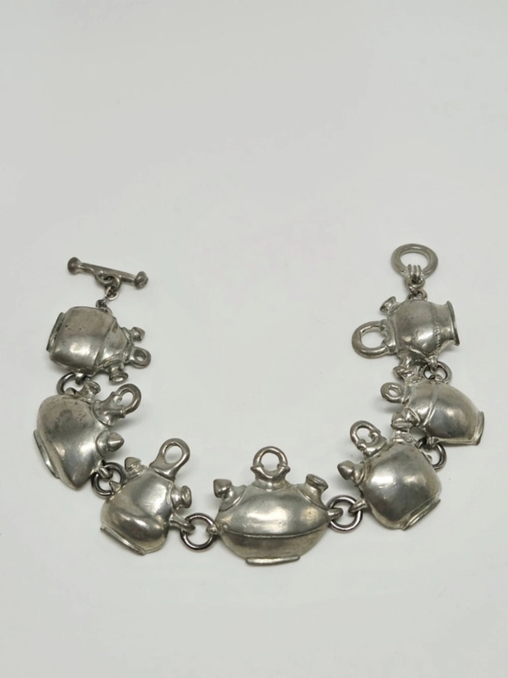Maurice Milleur Silver Charm Bracelet all Signed dated replicas of George Ohr